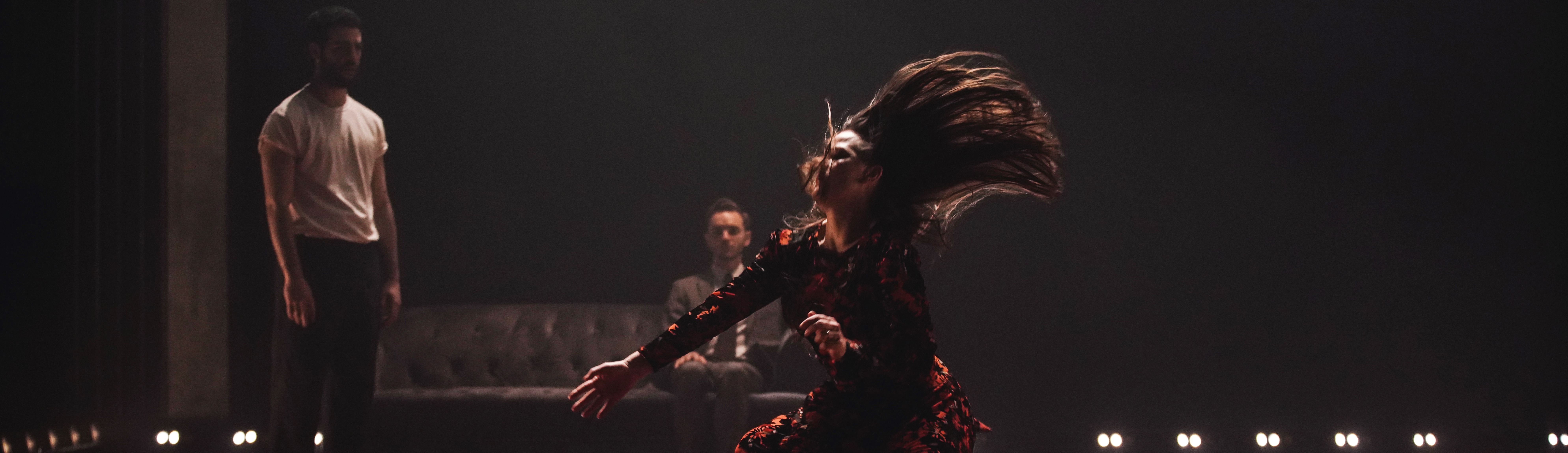 Image of Bobbi Jene Smith falling with her hair captured in dramatic motion